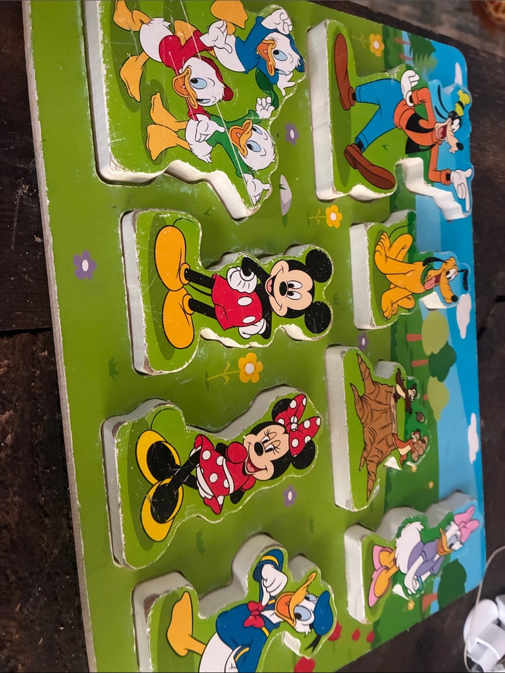 Melissa & Doug Disney Wooden Peg Puzzle in Green and Blue